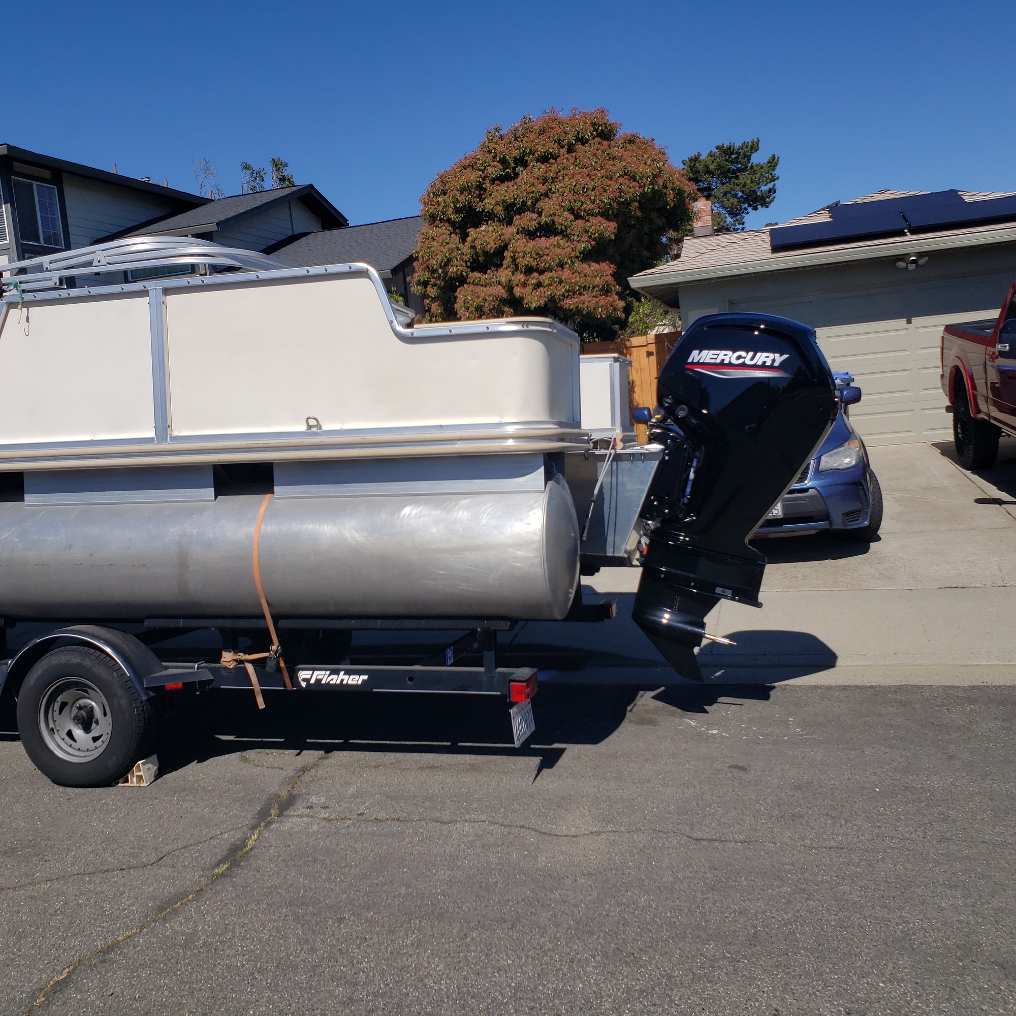 Sideview of Tritoon on Trailer with Motor