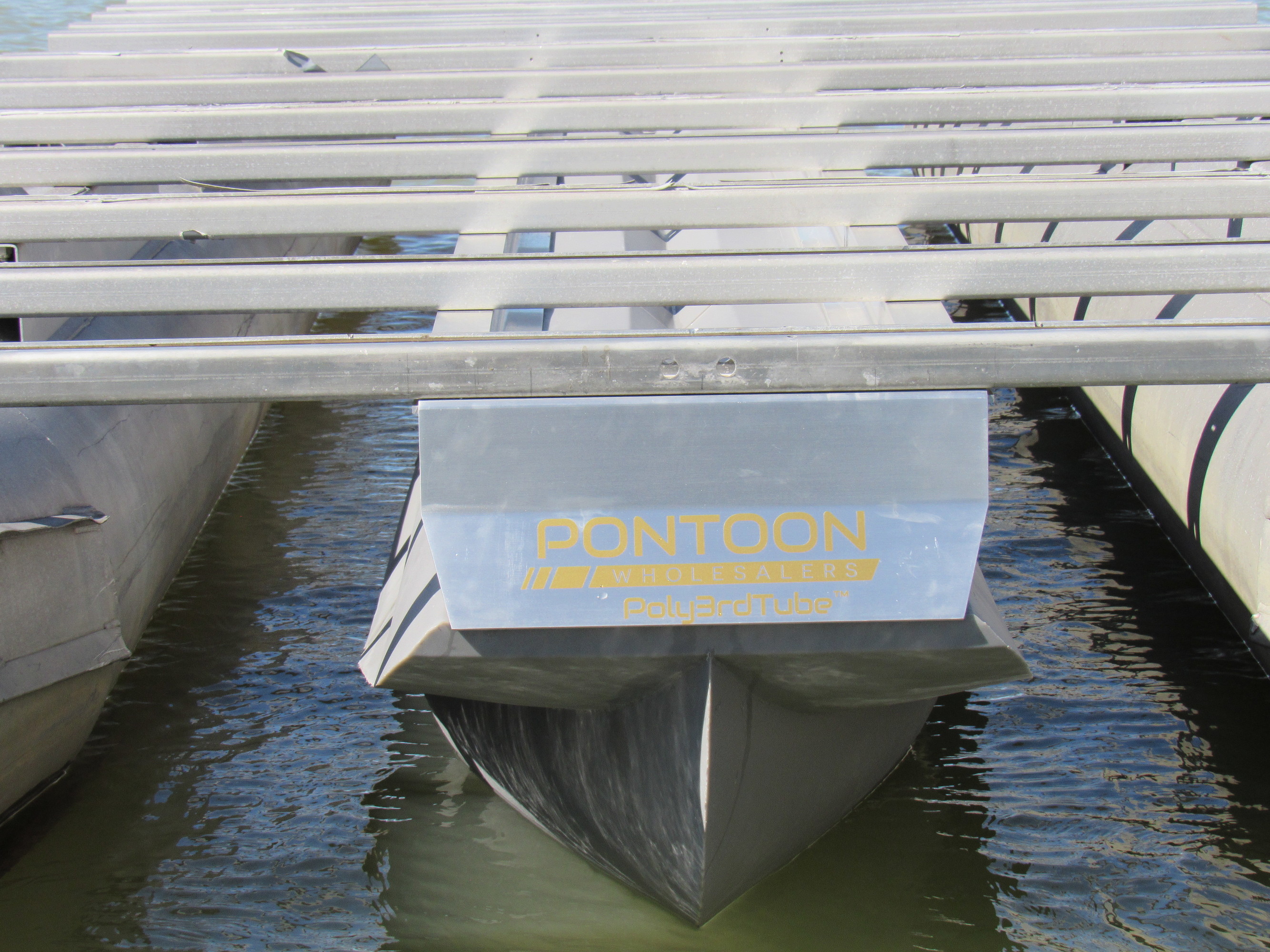 a metal structure on a third tube pontoon on the water